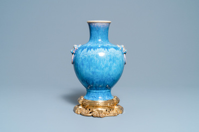 A Chinese gilt bronze-mounted flamb&eacute;-glazed vase, 18/19th C.