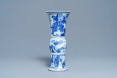 A Chinese blue and white 'gu' vase with figurative design, Kangxi