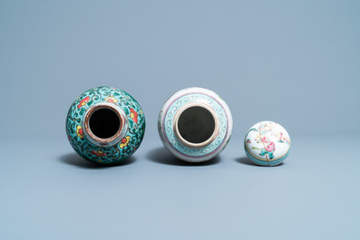 Six Chinese famille rose vases and various wooden stands and covers, 19/20th C.