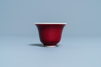 A Chinese monochrome sang de boeuf-glazed wine cup, 19/20th C.
