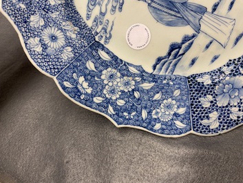 A large oval Chinese blue and white 'Romance of the Western Chamber' dish, Qianlong