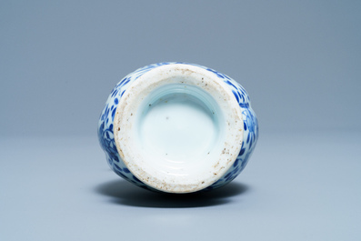A Chinese blue and white two-spouted oil and vinegar bottle, Kangxi