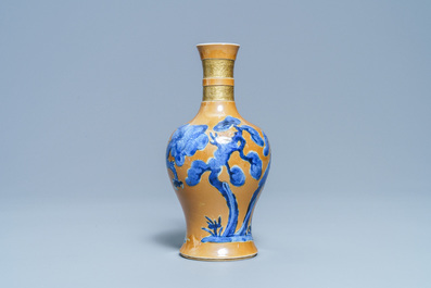 A Chinese caf&eacute;-au-lait-ground 'dragon and tiger' vase, Kangxi