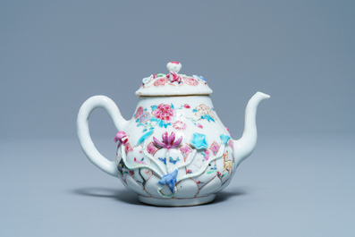 A Chinese famille rose relief-decorated teapot and cover, Yongzheng