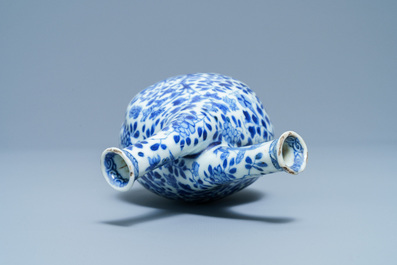 A Chinese blue and white two-spouted oil and vinegar bottle, Kangxi
