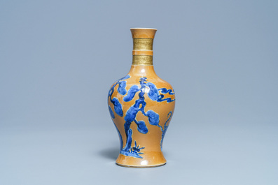 A Chinese caf&eacute;-au-lait-ground 'dragon and tiger' vase, Kangxi