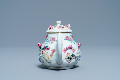 A Chinese famille rose relief-decorated teapot and cover, Yongzheng