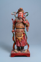 A large polychromed wooden figure of a guardian, China or Vietnam, 19th C.