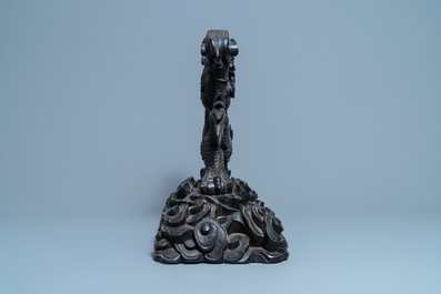 A large Chinese carved wooden 'dragon' stand for a dish or a mirror, 19th C.
