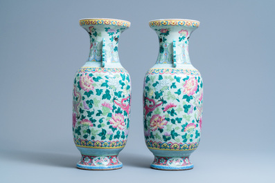 A pair of Chinese famille rose celadon-ground 'dragon' vases, 19th C.