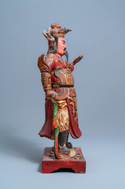 A large polychromed wooden figure of a guardian, China or Vietnam, 19th C.