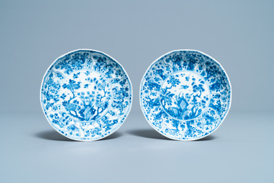 Six Chinese blue and white dishes, a teapot and a helmet-shaped jug, Kangxi and later