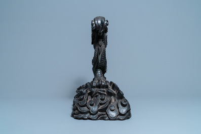 A large Chinese carved wooden 'dragon' stand for a dish or a mirror, 19th C.