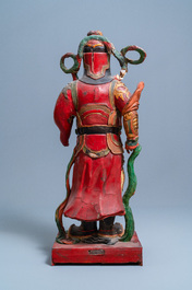 A large polychromed wooden figure of a guardian, China or Vietnam, 19th C.