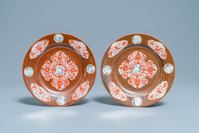 Six Chinese iron red and grisaille capucin brown-ground plates, Qianlong