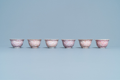 Six Chinese famille rose lotus-molded cups and saucers, Yongzheng