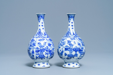 A pair of Chinese blue and white bottle vases, Kangxi