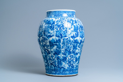A massive Chinese blue and white vase with floral and landscape panels, Kangxi