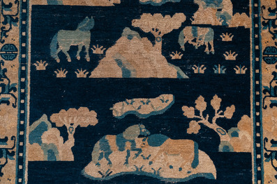 A large Chinese rectangular 'Eight horses of Mu Wang' carpet, 19th C.