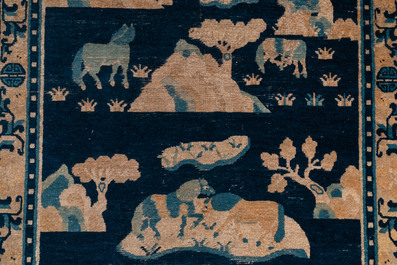 A large Chinese rectangular 'Eight horses of Mu Wang' carpet, 19th C.