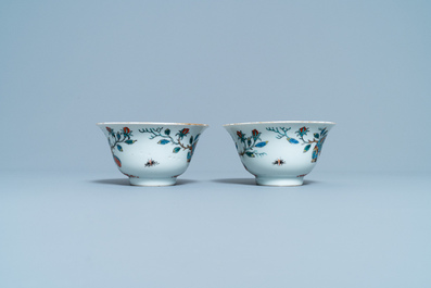 A pair of Chinese Dutch-decorated 'parrot' bowls, Kangxi