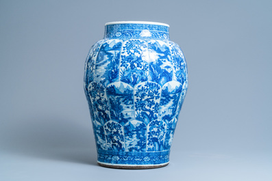 A massive Chinese blue and white vase with floral and landscape panels, Kangxi