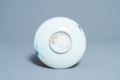 A Chinese blue and white ko-sometsuke 'poem' plate for the Japanese market, Tianqi