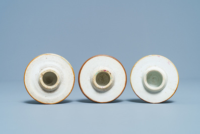 A Chinese famille rose garniture of five vases with antiquities, Qianlong