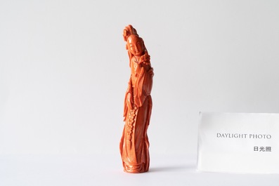 A Chinese carved red coral figure of a lady, 19/20th C.