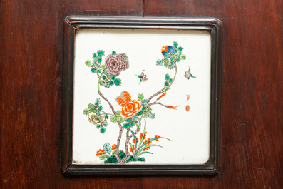 Four Chinese famille verte plaques in wooden frames, 19th C.