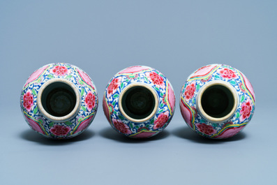 A Chinese famille rose garniture of five vases with antiquities, Qianlong