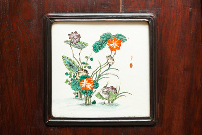 Four Chinese famille verte plaques in wooden frames, 19th C.