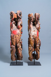 Two Chinese gilded and polychromed wooden colon fragments with Buddhist lions, 18/19th C.