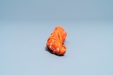 A Chinese carved red coral figure of a lady, 19/20th C.