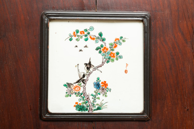 Four Chinese famille verte plaques in wooden frames, 19th C.