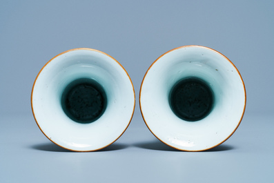 A Chinese famille rose garniture of five vases with antiquities, Qianlong