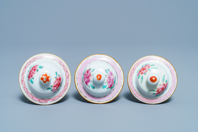 A Chinese famille rose garniture of five vases with antiquities, Qianlong