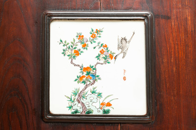 Four Chinese famille verte plaques in wooden frames, 19th C.