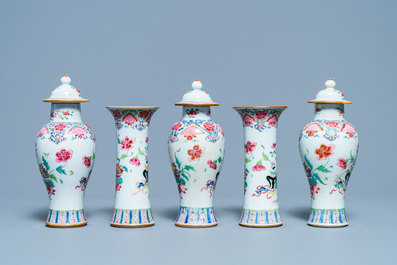A Chinese famille rose garniture of five vases with antiquities, Qianlong