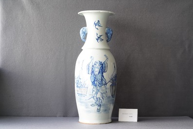 A Chinese blue, white and copper red vase with elephant handles, 19th C.