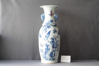 A Chinese blue, white and copper red vase with elephant handles, 19th C.
