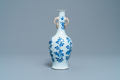 A Chinese blue and white vase with elephant-head handles, Kangxi
