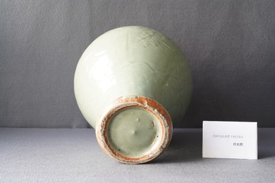 Een Chinese Longquan celadon 'meiping' vaas met reli&euml;fdecor van 'Drie vrienden van de winter', Ming