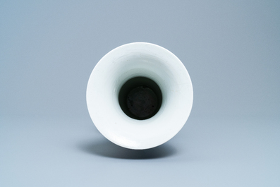 A Chinese famille noire 'magpie and prunus' yenyen vase, Kangxi