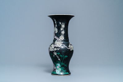 A Chinese famille noire 'magpie and prunus' yenyen vase, Kangxi