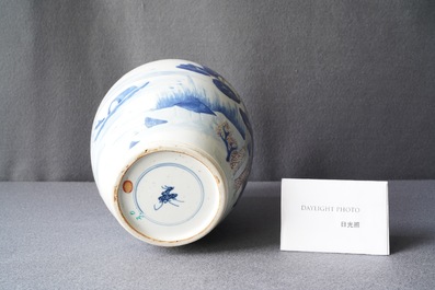 Een Chinese blauw-witte, koperrode en celadon vaas met landschapsdecor, Kangxi