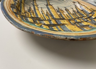 A large Italian maiolica dish with a view on San Gimignano, Deruta, 16/17th C.