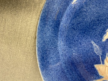 A Chinese blue, white and copper red powder blue-ground dish, Kangxi
