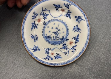 Six Chinese blue, white and copper red cups and saucers, Kangxi