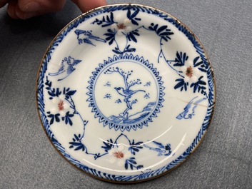 Six Chinese blue, white and copper red cups and saucers, Kangxi